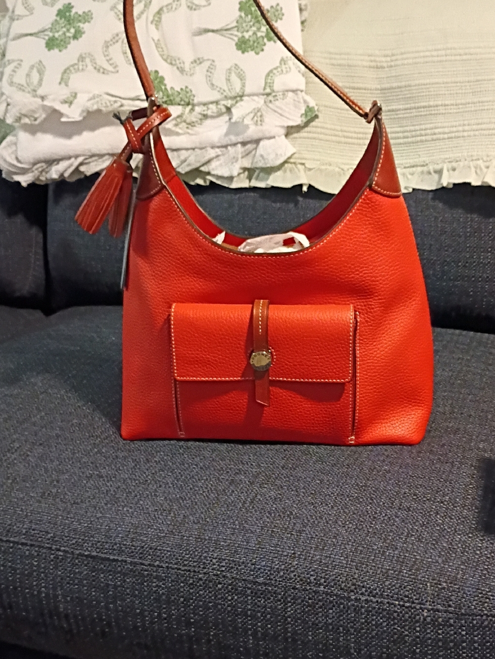Dooney And Bourke Orange Leather Tasseled Hobo..Color Listed As Persimmon